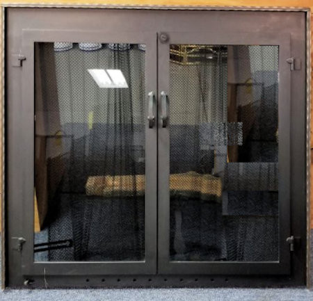 Buzzards Bay (Molding on surround)  All black finish, with half inch hammer and groove molding, twin doors standard forged handles, smoke glass. Comes with slide mesh spark screen.